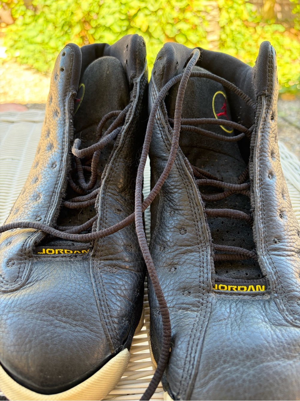 Jordan Men’s Black Leather High-Top Sneakers with Yellow Logo